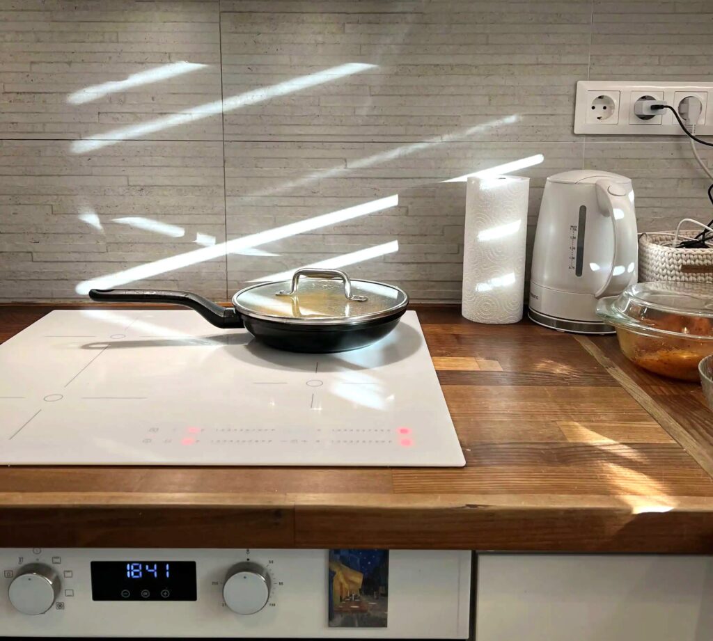 empty kitchen counter with a single coffee mug